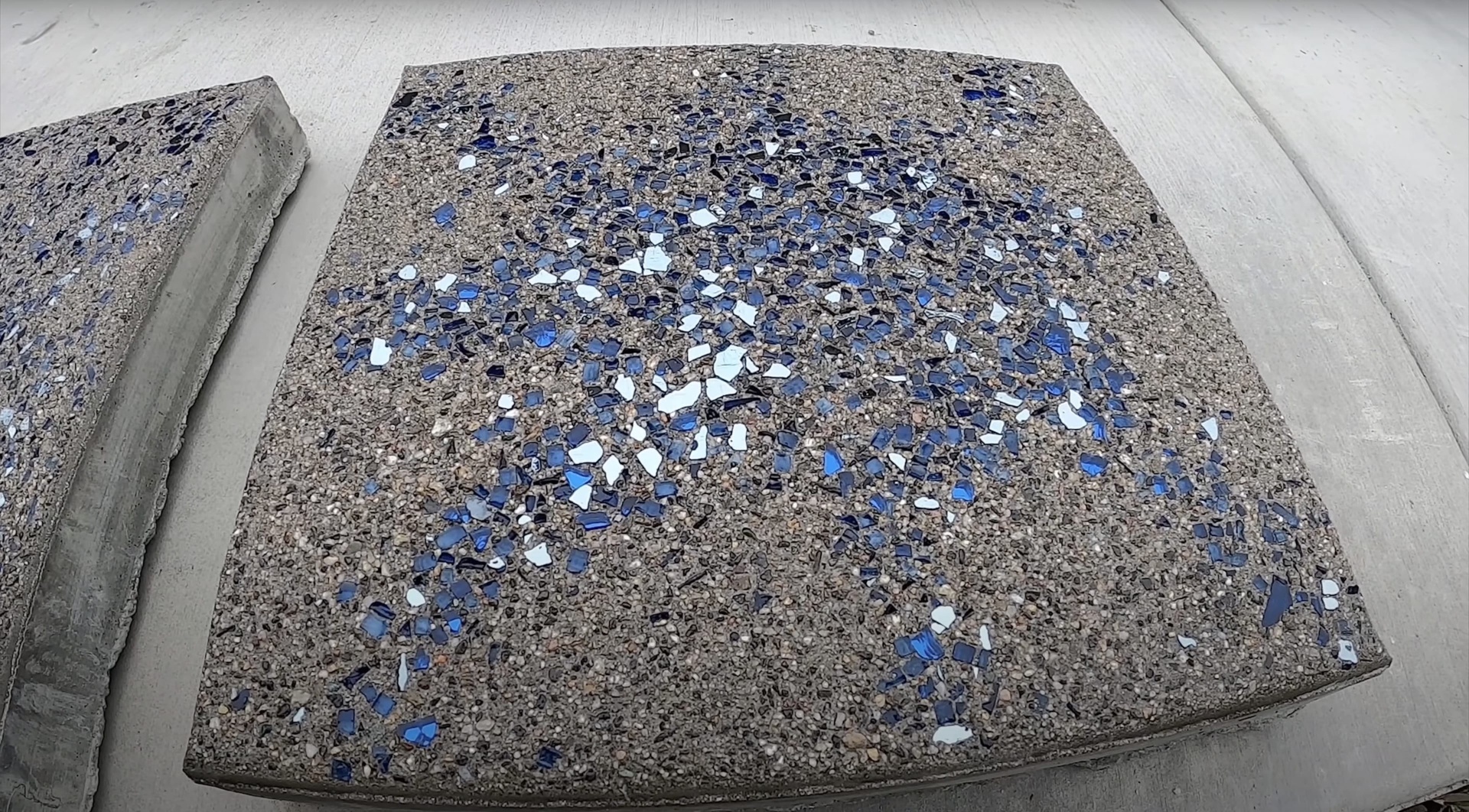 Exposed aggregate concrete with blue and white decorative stones Exposed aggregate concrete Mt Vernon VA - decorative blue and white aggregate concrete surface